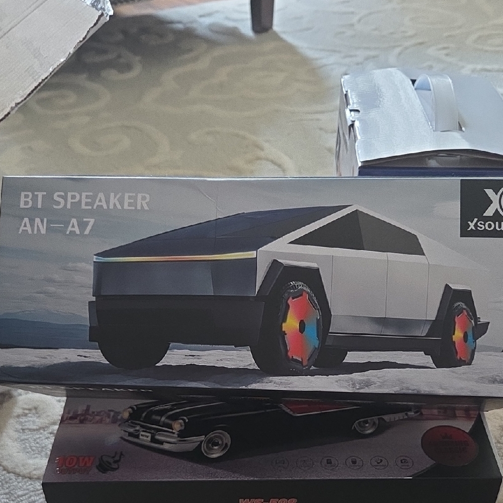 Black and White Portable Bluetooth Speaker with Futuristic Design